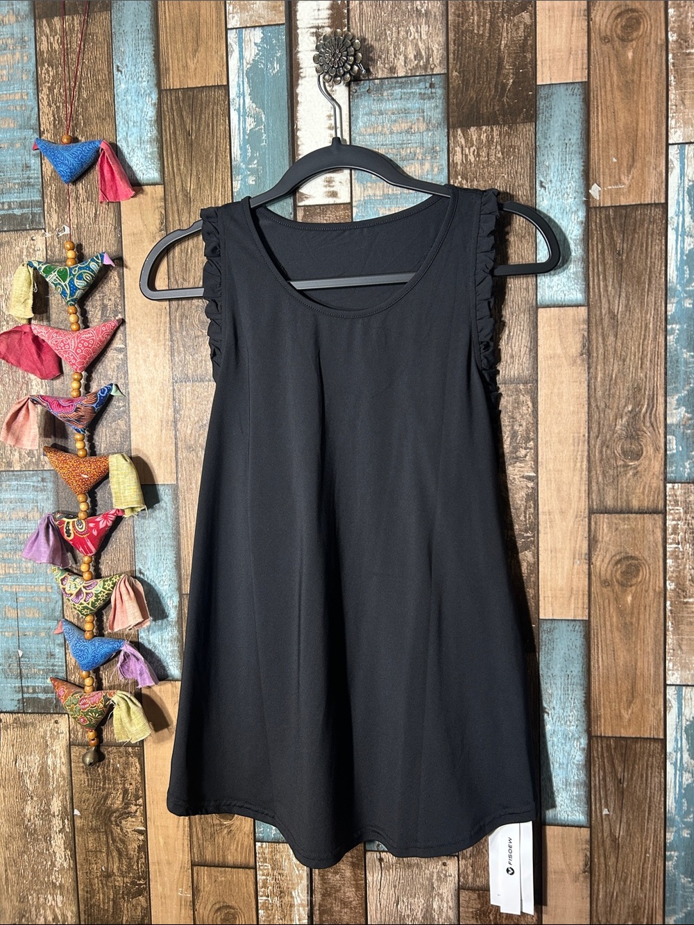 Sleeveless Black Ruffle-Trim A-Line top